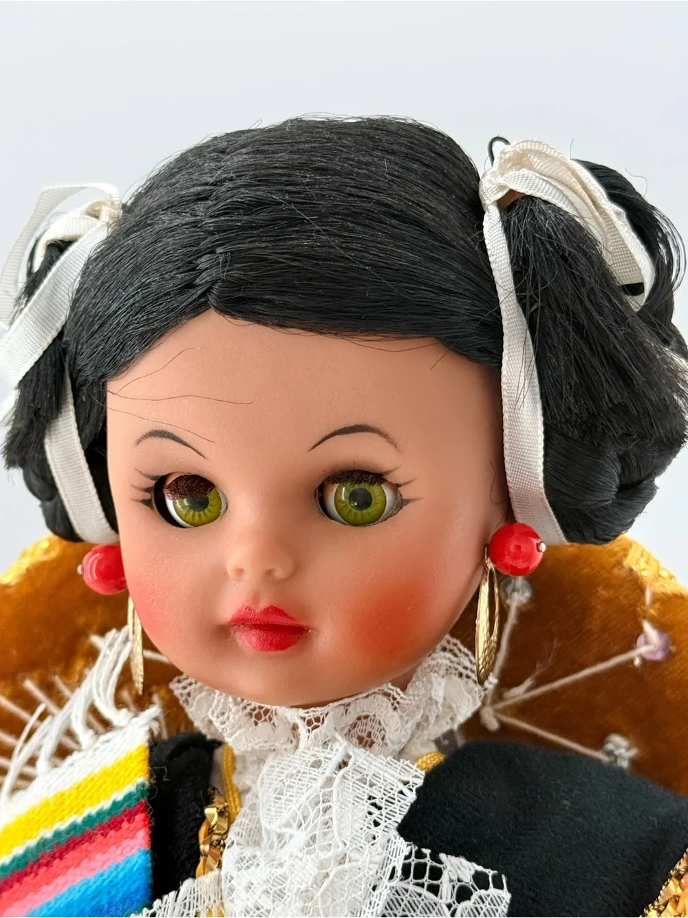 Traditional Black Cloth Doll with Yellow Sash and Lace Accents